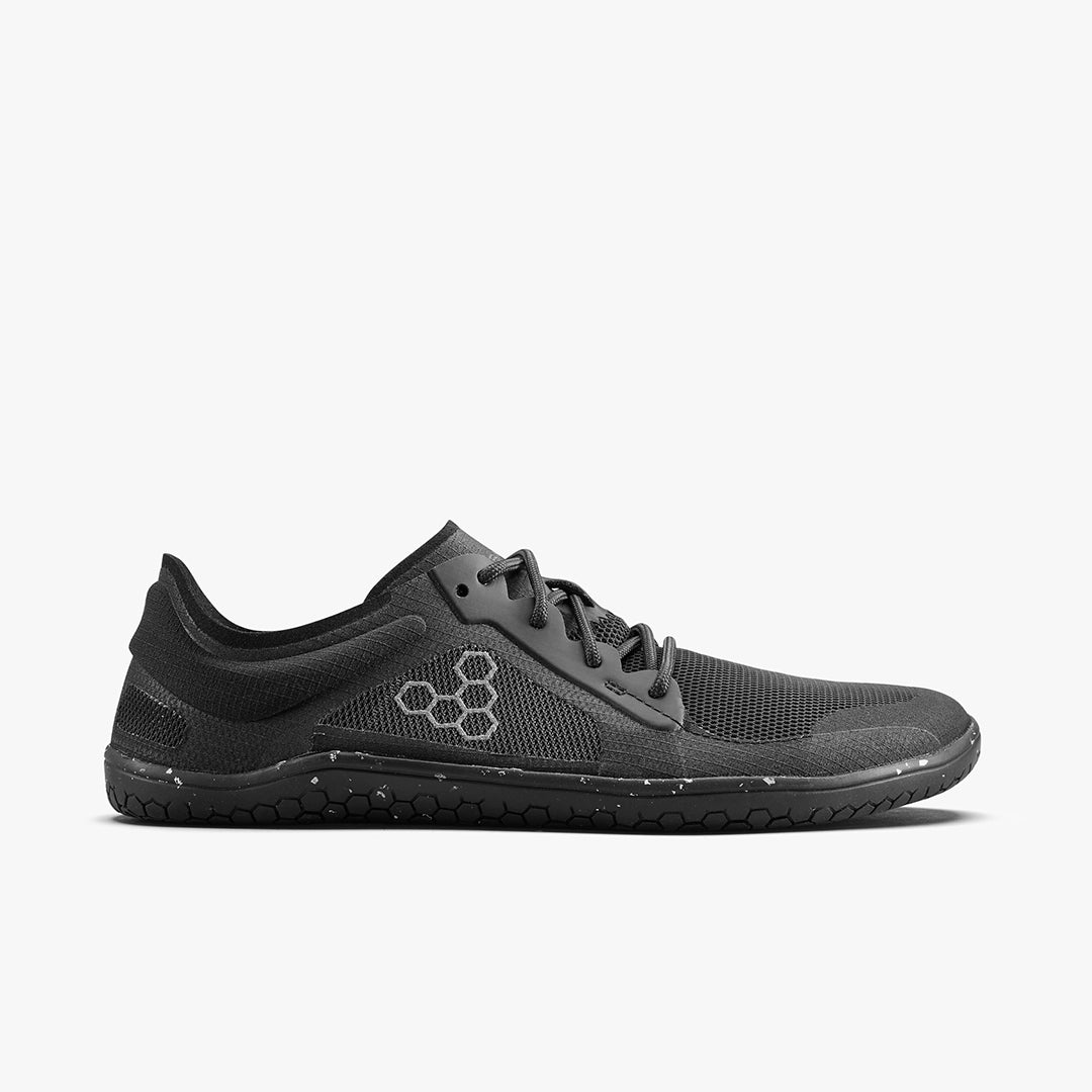 Vivobarefoot Primus Lite III.5 herrsko i färgen Obsidian – ultralätt barfotasko med flexibel sula, bred tåbox och återvunnet mesh för naturlig rörelse och löpning.