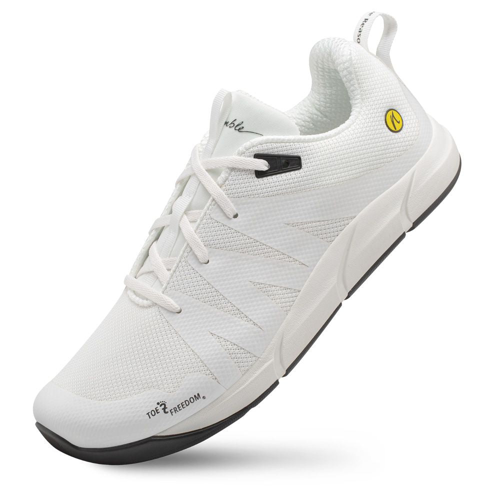 Vit löparsko från Joe Nimble, modell Addict, med bred tåbox, noll drop och minimalistisk design för naturlig fotrörelse och optimal komfort.