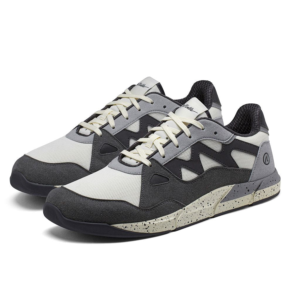 Joe Nimble Sneaker Addict – barfotasko för herr i grå, svart och offwhite med bred tåbox, flexibel yttersula och sportig design.