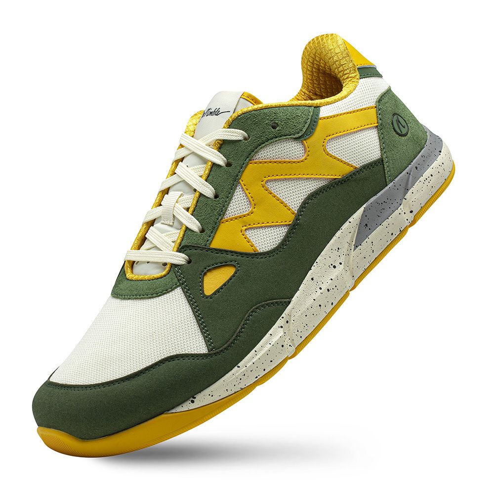 Joe Nimble Addict barfotasko för herr i grön, gul och vit färgkombination. Låg sneaker med bred tåbox, ventilerande ovandel och dämpad sula i stänkmönstrad grå-beige. Designad för naturlig rörelse och optimal komfort vid vardagsanvändning.