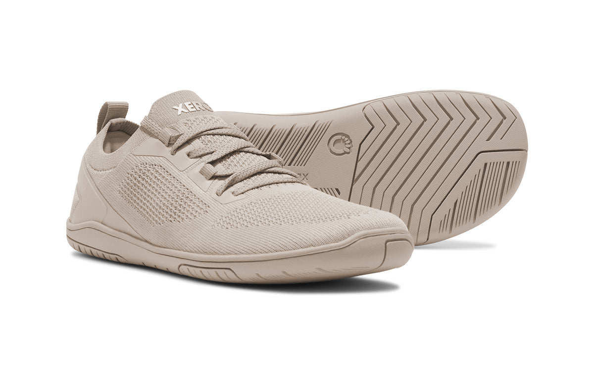 Xero Shoes Nexus Knit Silver Lining – stilren barfotasko i stickad beige mesh med bred tåbox, flexibel yttersula och noll drop för naturlig fotrörelse i vardagen